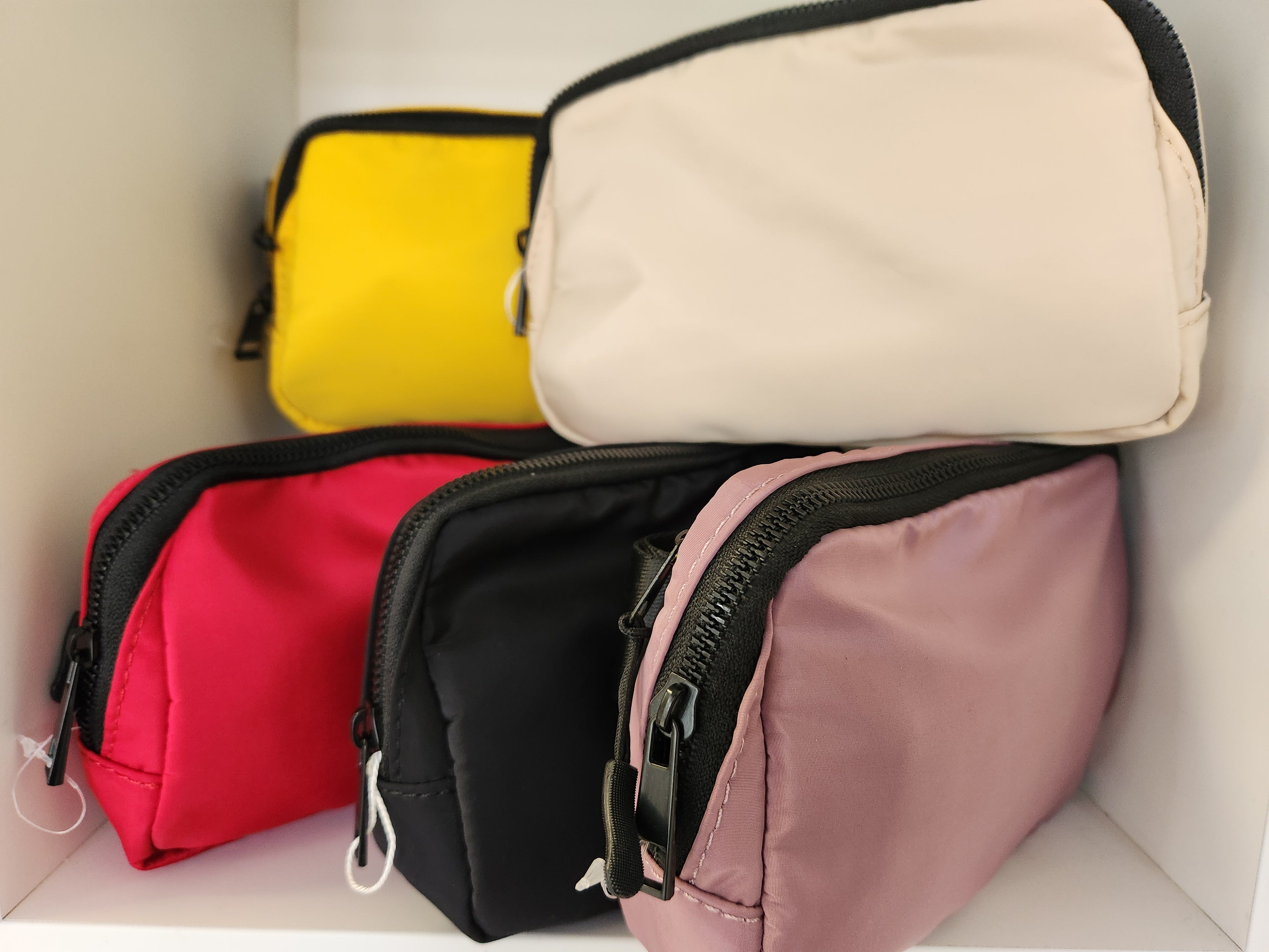 Cross-body belt bags.